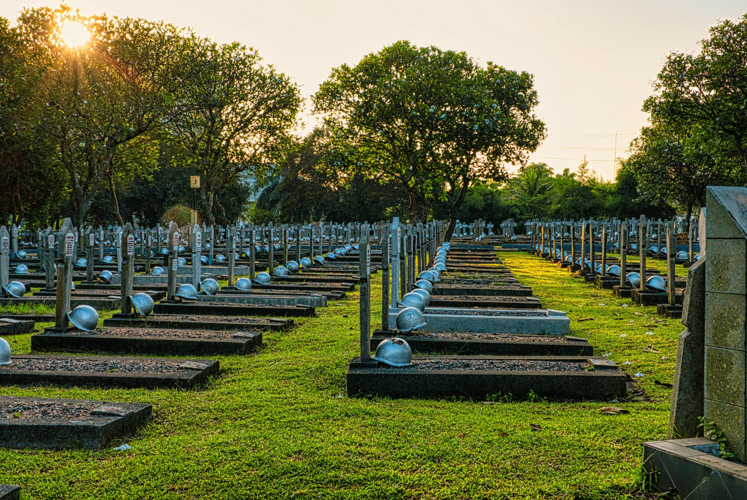 Fallen heroes graveyard with rows of headstones