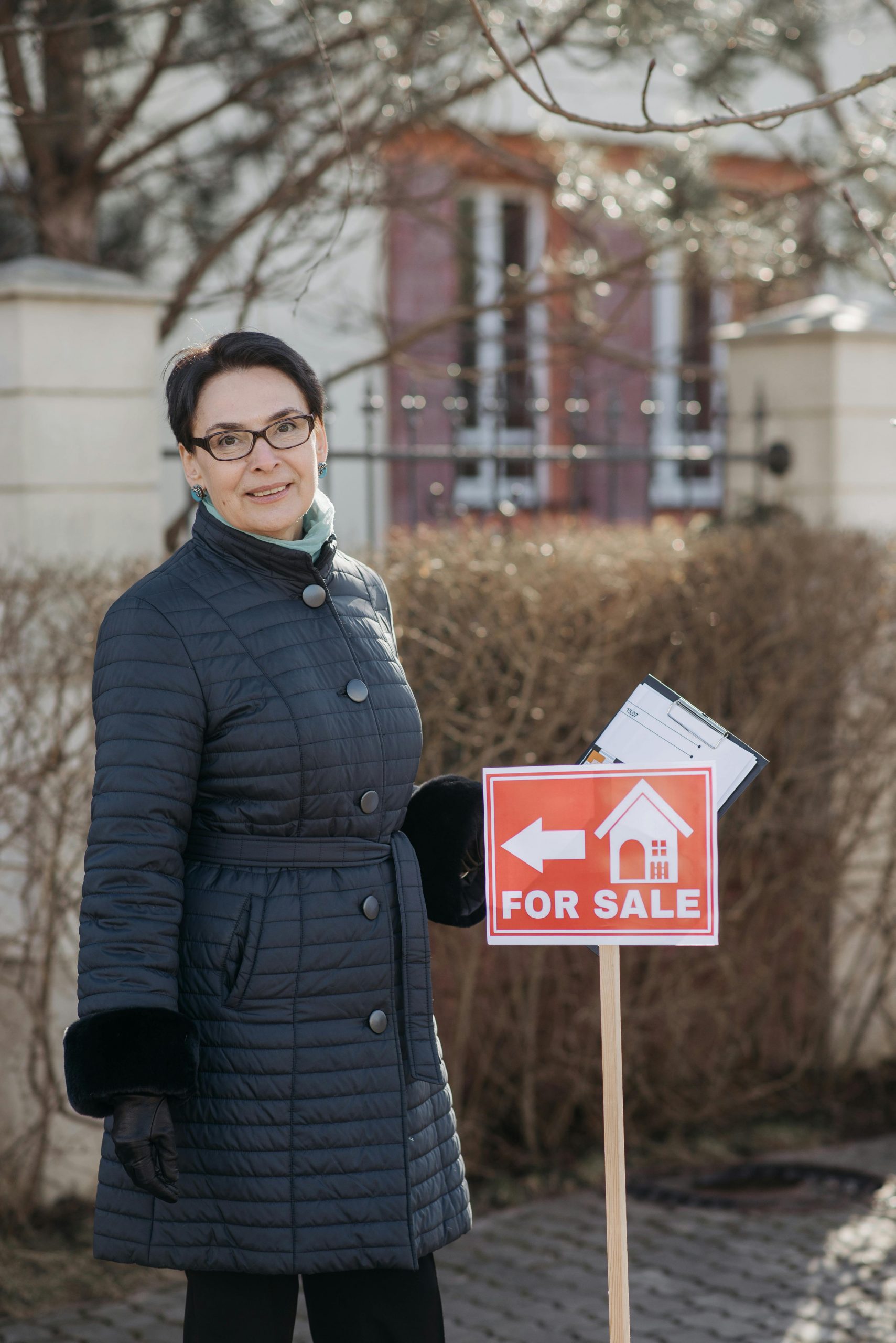 House for sale sign with buyer's agent